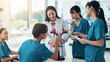 © peopleimages.com - Doctor, students and heart for medical lecture, education or practical assignment in teaching hospital. Healthcare, learn and group with professor for training on cardiac model at university in Japan