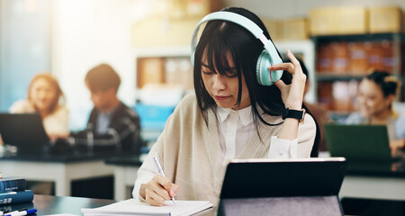 Poster - Headphones, tablet and woman writing at university with notes for literature assignment in class. Education, pen and Japanese student with digital tech studying for college exam, test or project.