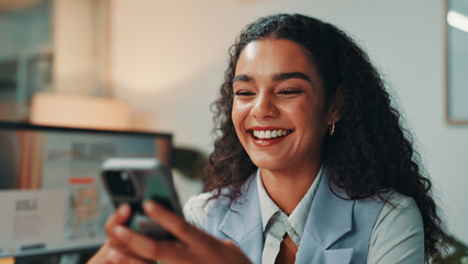 Poster - Woman, phone and smile in office for project, message and review for social media proposal. Person, reading and happy for research, planning and feedback or texting at creative agency for management