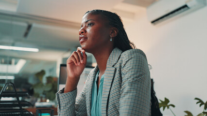 Poster - Thinking, confused and black woman in office with planning, decision or choice for company investment. Brainstorming, low angle and African female financial manager with ideas for corporate budget.