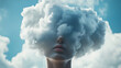 © Wilker - Close-up view of a stylized female face partially obscured by a voluminous, textured cloud formation resembling a head of hair. The cloud's texture is soft and fluffy with varying densities, creating