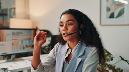 Leinwandbilder - Customer service, office and business woman on computer for virtual meeting, talking and interview. Media agency, creative worker and person with headset for discussion, consultation and webinar