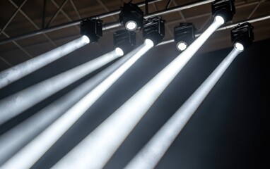 Poster - bright white spotlights in dark room