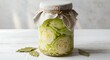 © mhmdyatt - Preparing Cabbage in Jar with Rustic Cover Preserving Food at Home