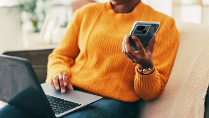 Fototapete - Hands, laptop and phone with person in living room of home for ecommerce or online shopping. App, communication and computer with customer on sofa in apartment to search for bargain or retail sale