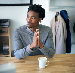 Fototapete - Business, thinking and black man with coffee, hands together and planning with problem solving. African person, employee and consultant with creativity, fashion designer and inspiration with solution