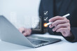 © C VrStudio - Business performance checklist concept, Businessman using laptop take an assessment,An businessman checklist online survey filling form list options business employee security procedures.