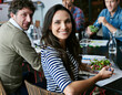 © peopleimages.com - Meeting, eating and business woman with salad in office for team building lunch for collaboration. Discussion, smile and portrait of female designer with colleagues enjoying healthy meal in workplace