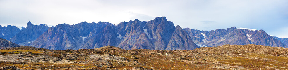 Wall Mural - a panorama of the mountain range at bear islands, northeast greenland national park, with the grundt