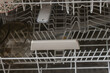 © Roman Bjuty - Dishwasher with dirty dishes. Wire program to store dishes