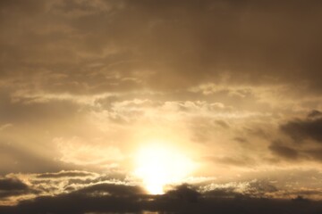 Wall Mural - picturesque view of beautiful sky with setting sun and clouds