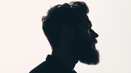 Leinwandbilder - Silhouette of a bearded man with fade effect against a clean white background at an indoor setting