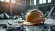 © rosen thal - Damaged yellow hard hat on debris-filled floor, construction site accident