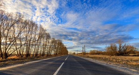 Wall Mural - a road with a clear sky above it