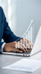 Poster - Business growth with bar graph overlay. Professional typing on laptop with success metrics. Modern corporate technology and data visualization.