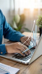 Poster - Hands typing on laptop with growth graph overlay. Business professional analyzing financial data. Digital workspace with productivity tools.
