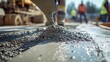 © ArpPSIqee - Concrete worker pouring concrete for sidewalk. Featuring technique and attention to detail