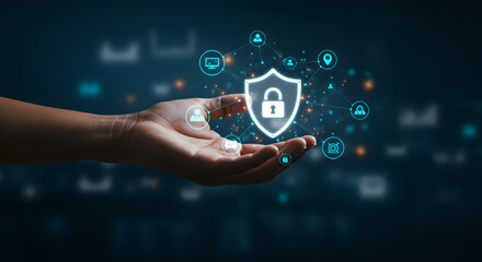 Poster - Hand Presenting Glowing Shield With Padlock Symbolizing Cyber Security on Dark Blue Background