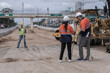 © ENGINEER - STUDIO - construction worker with helmet. Survey man working on Site. construction worker on construction site.