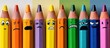 © 娜 赵 - This image is a close-up shot of a row of colored pencils. Each pencil displays a different cartoon-like facial expression drawn on its side.
