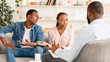 © Prostock-studio - Marital Therapy. Irritated Black Woman Explaining To Counselor Relationship Problems With Her Husband, Annoyed Husband Doesn't Agree With Her
