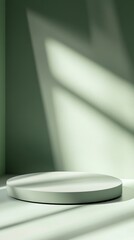 Poster - Minimalist Display Area With Circular Platform Illuminated by Soft Light in a Serene Green-Toned Environment Suitable for Showcasing Products