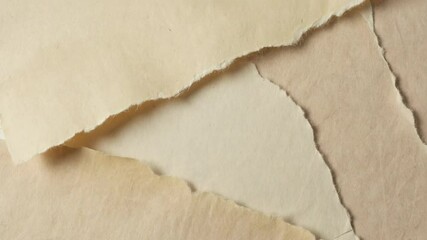 Aufkleber - A close-up of a torn page on a table.