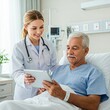 © organik - Smiling healthcare worker with tablet supporting patient in hospital