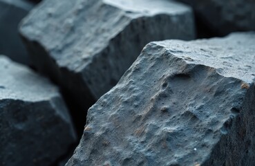 Poster - Close-up of granite blocks. Rough cut stone texture. Quarried stone, industrial construction material, raw resource. Construction theme, natural resources extraction, mining. Mineral resource for