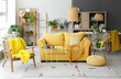 © Pixel-Shot - Interior of modern living room with yellow sofa, armchair and houseplants