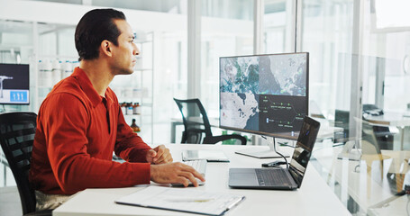 Poster - Computer screen, map and wind turbine with business man in office for renewable energy or sustainability. Electricity, laptop and windmill with location on display for development or engineering