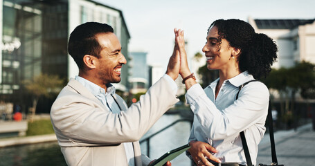 Poster - Business, celebration and people high five with tablet in city for investment success, b2b deal or partnership. Finance employees, teamwork or happy with support for digital contract or collaboration