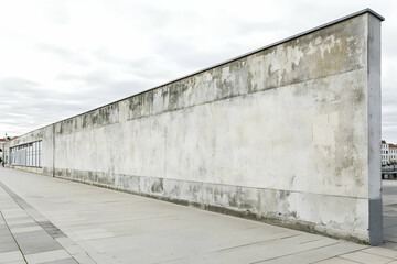 Poster - Long Weathered Concrete Wall Urban Exterior Minimalist Architecture