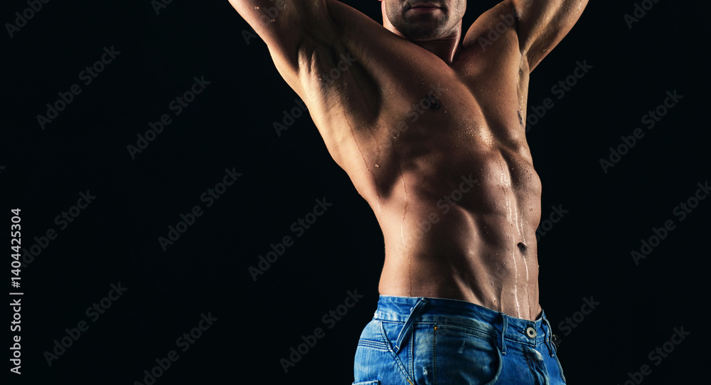 Naked muscular man in jeans. Nude male torso. Denim fashion. Sexy