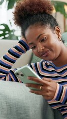 Aufkleber - Phone, laughing and smile with woman on sofa in living room of home for app or social media browsing. Communication, internet and text message with happy person in apartment for mobile networking