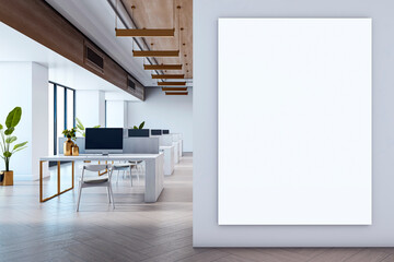 Poster - Modern office interior with blank vertical poster mockup on wall and open-plan workspace with desks, chairs, and decor in bright lighting. 3D Rendering
