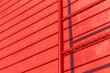 © Daan - Red wall with a ladder