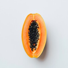 Aufkleber - Halved Papaya with Black Seeds on a White Surface - Tropical Fruit Still Life