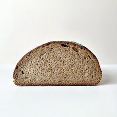 Aufkleber - Half Slice of Dark Rye Bread with Rustic Texture and Rich Color on White Background for Food Photography
