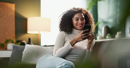 Fototapete - Happy woman, typing and relax with phone on sofa for social media, browsing or reading news at home. Female person with smile on mobile smartphone for online chatting, texting or scrolling at house