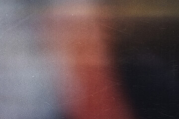 Poster - Grainy red gradient background fading to black with a subtle light source emanating from the top