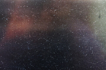Fototapete - A grunge background with a dark brown and orange gradient. The background features a speckled texture with brown and orange hues.