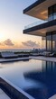 © berkah nikah - Modern penthouse suite with infinity pool overlooking the city at sunrise.