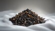 © DigitalDruid - Heap of dry black tea isolated on a white background