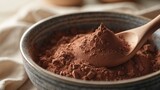 Preparing chocolate dough. Blending cocoa powder with flour in a bowl, close-up