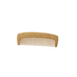 wooden comb on a solid white background