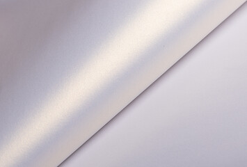 Aufkleber - Paper background with satin pearlescent texture. Glossy folded surface with soft curve and gradient, pale lilac and lavender hue, elegant abstract composition with gentle shimmer and polished sheen..