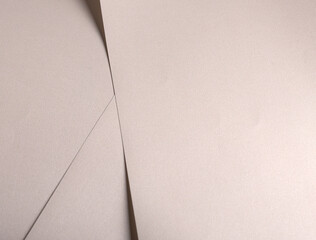 Aufkleber - Paper background with satin pearlescent texture. Matte folded layers, smooth surface in pale gold and champagne hue, elegant neutral composition with subtle contour and refined structure..
