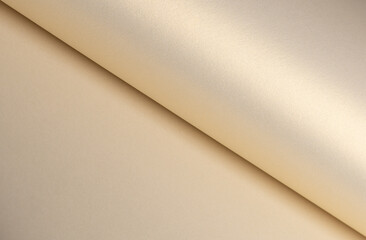 Aufkleber - Paper background with satin texture. Folded smooth surface in beige, champagne, and pale gold tones, glossy pearlescent finish, warm pastel glow, elegant minimal design, refined composition..
