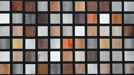 Poster - Multicolored wood samples as a textured abstract background. Samples are arranged in a grid. Samples have different colors and sizes